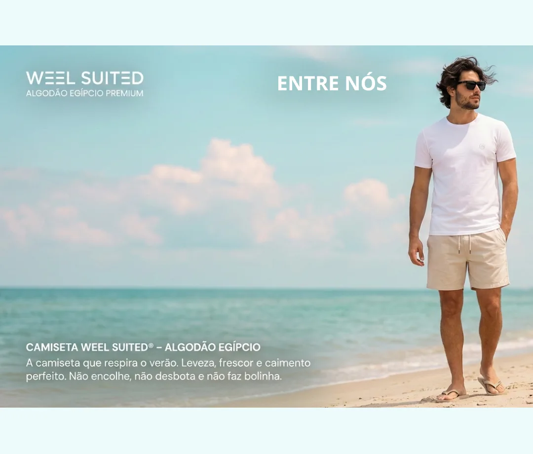 Modelo usando camiseta branca Weel Suited na praia